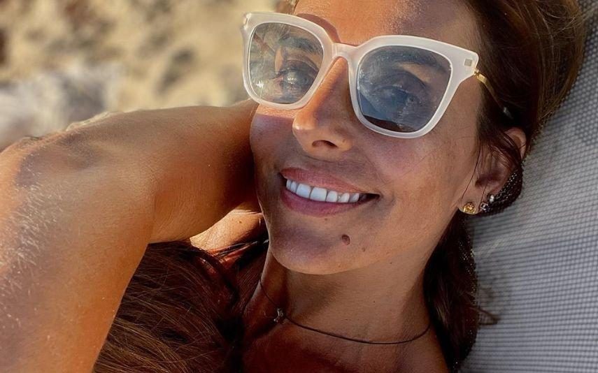 Catarina Furtado apanhada na praia sozinha com os filhos