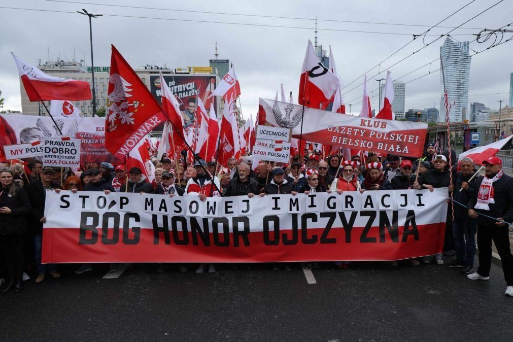 Milhares de polacos contestam migrantes ilegais a dias das presidenciais